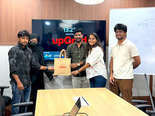 upGrad Hyderabad Somajiguda office - student and parents with the counselling team after their study abroad session